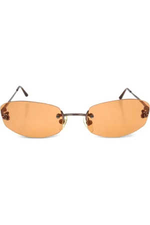 CHANEL Lentes de sol con armazón ovalada y logo CC 1990-2000