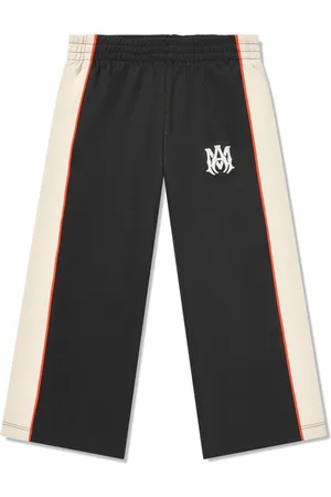 AMIRI Pants con paneles estampados