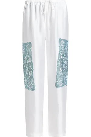 BITE Pantalones de seda con estampado de encaje