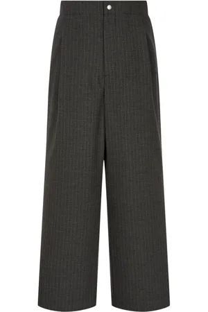 Studio Tomboy Pantalones anchos con rayas diplomáticas estampadas