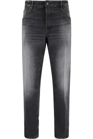 PT Torino Jeans con diseño desgastado