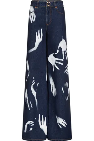 AREA Jeans anchos con estampado de mano