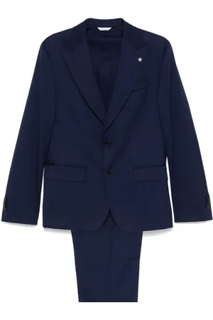 Manuel Ritz Traje con detalle de broche
