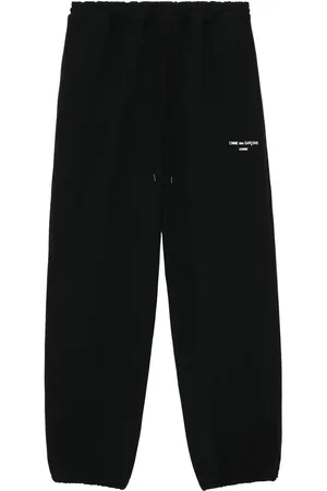 Comme des Garçons Pants con logo estampado