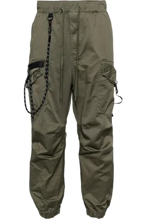 Musium Div. Pantalones tapered con parche del logo