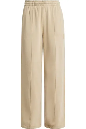 Lacoste Pants anchos con distintivo