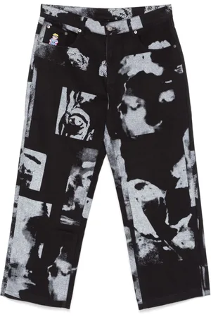 KIDSUPER STUDIOS Pantalones Faces Collage