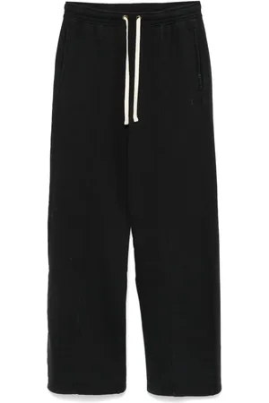 Champion Pants anchos con efecto lavado