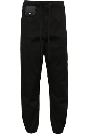 Musium Div. Pantalones con bolsillos en 3D