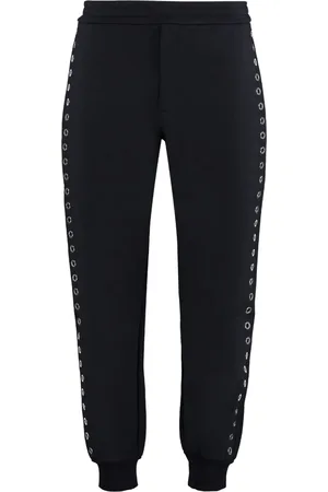 Alexander McQueen Pants con detalles de ojales
