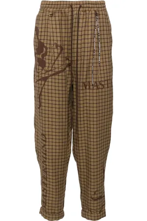 MASTERMIND Pantalones con cuadros estampados