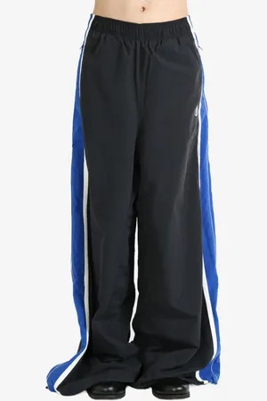 Vetements Pants con rayas laterales