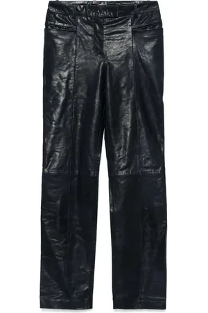 REMAIN Pantalones slim