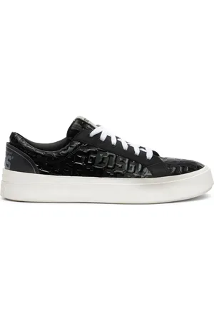 GCDS Tenis con monograma de charol