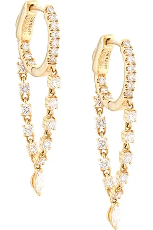 Anita Aretes huggies en oro amarillo de 18kt con diamantes