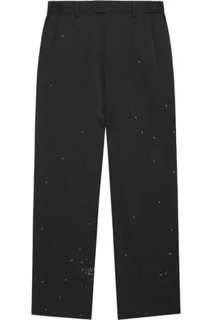 UNDERCOVER Pantalones con diseño bordado