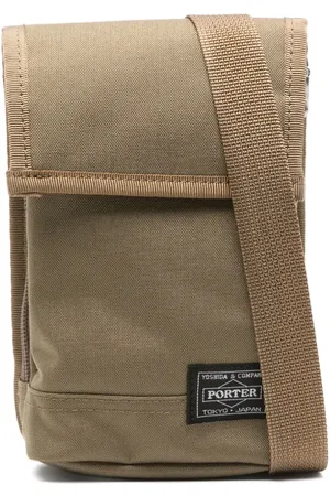 Comme des Garçons Mochila tipo mensajero de lona de x Porter