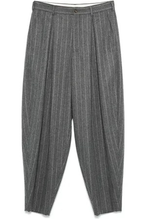 Comme des Garçons Pantalones con estampado de rayas diplomáticas