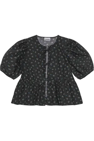 Ganni Blusa con peplum