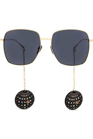 Gucci Lentes de sol con armazón cuadrada