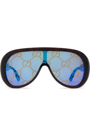Gucci Lentes de sol GG con armazón oversize
