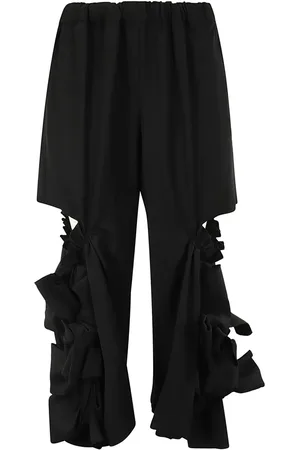 Comme des Garçons Pantalones con efecto envejecido