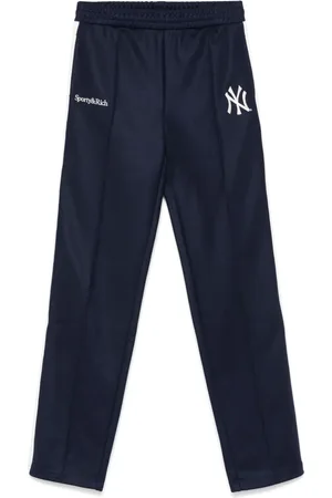 Sporty & Rich Pants con detalle de rayas