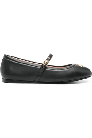 Moschino Flats con letras del logo
