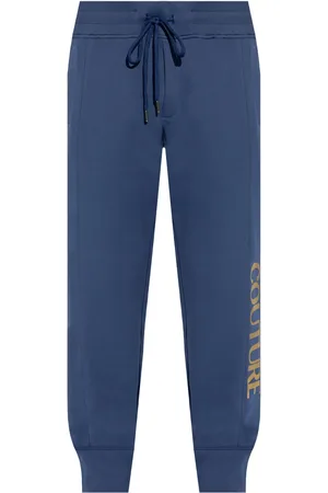 VERSACE Pants con logo
