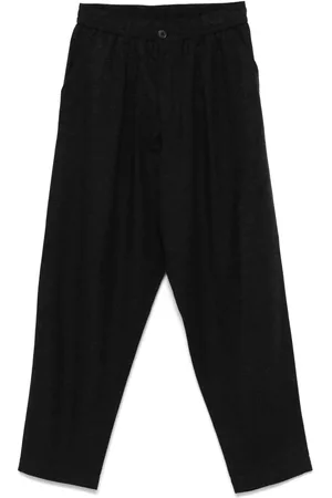 Universal Works Pantalones tapered con pinzas