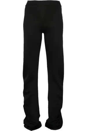 Jade Cropper Pantalones stretch con diseño retorcido