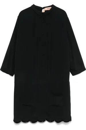 Nº21 Vestido corto con diseño plisado