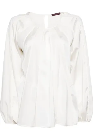 High Blusa manga larga con costuras invertidas