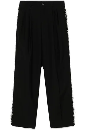 NOIR KEI NINOMIYA Pantalones con imperdible