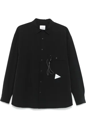 and wander Camisa de tejido