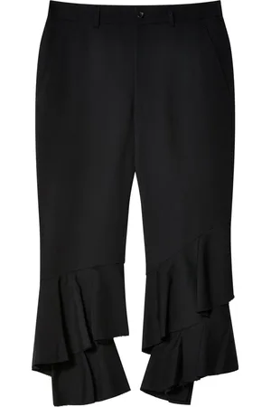 Comme des Garçons Pantalones a capas