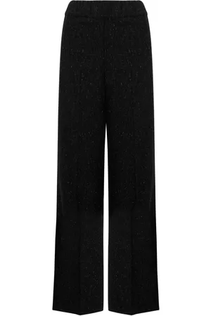 D.EXTERIOR Pantalones acampanados con efecto metalizado