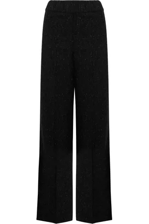 D.EXTERIOR Pantalones acampanados con efecto metalizado