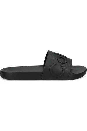 Calvin Klein Flip flops con logo en relieve