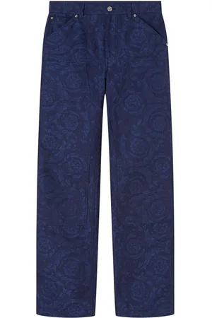 VERSACE Pantalones con estampado Barocco