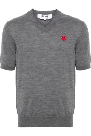 Comme des Garçons Suéter con parche de corazón