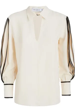 SIMONA CORSELLINI Playera con detalle de ojales