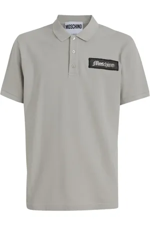 Moschino Playera tipo polo con aplique del logo