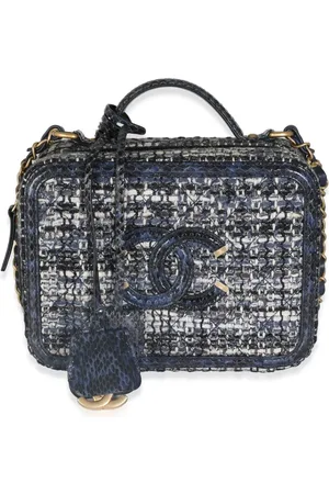 CHANEL Cosmetiquera de tweed con logo CC 2018