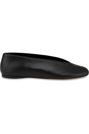 Moschino Flats con puntera redonda