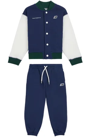 New Balance Traje deportivo con parche del logo