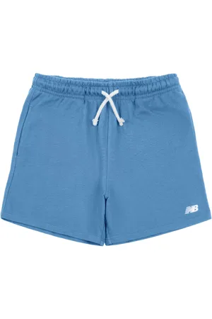 New Balance Shorts con logo bordado
