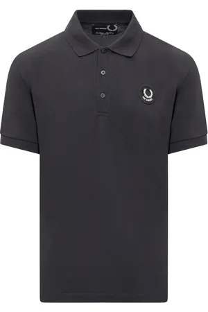 Fred Perry Playera tipo polo con parche del logo