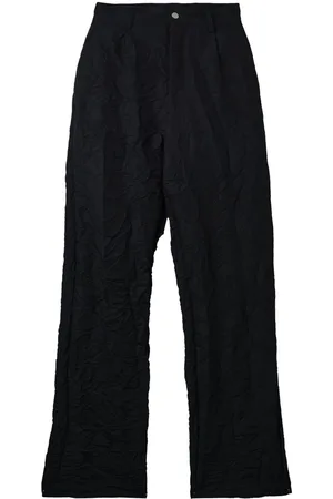 Spencer Badu Pantalones con pinzas y efecto arrugado