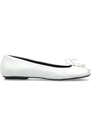 Furla Flats con placa del logo